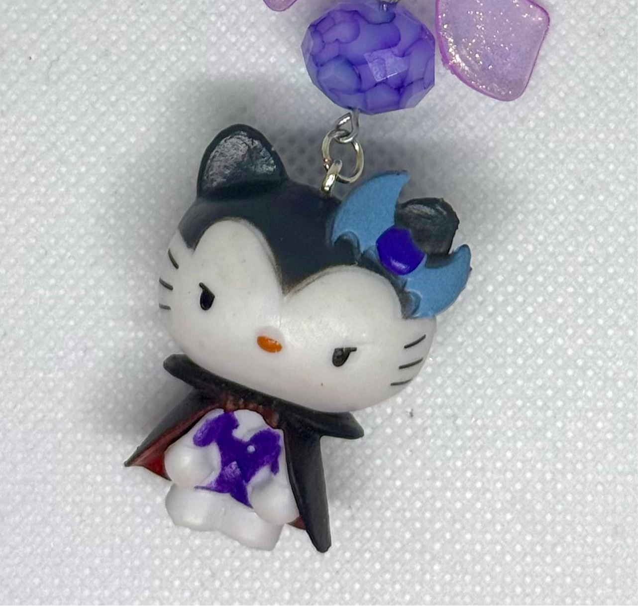 purple dracu-kitty charm