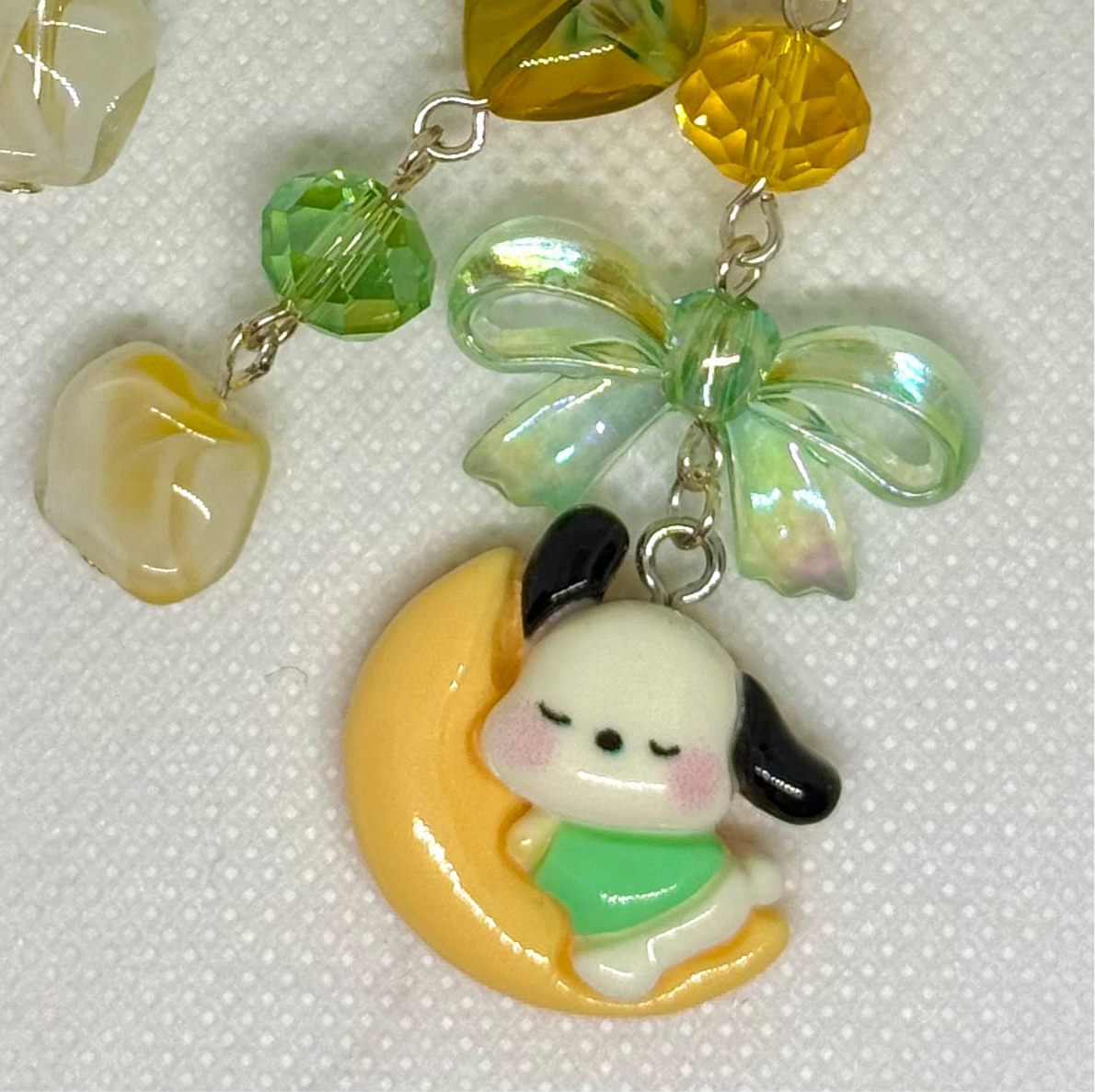 green and yellow pochacco charm