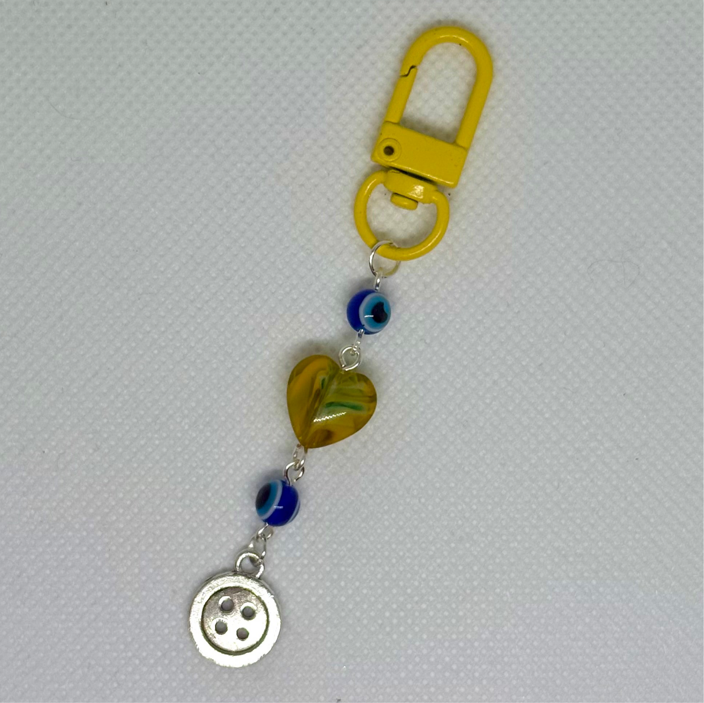 coraline inspired mini-charm