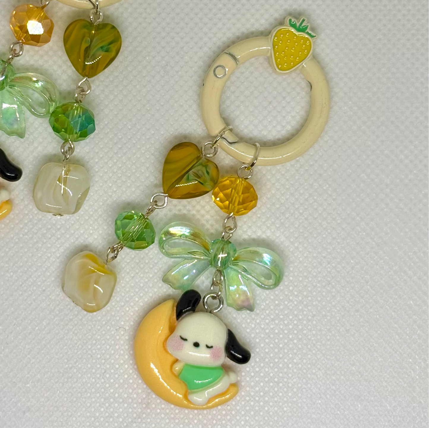 green and yellow pochacco charm
