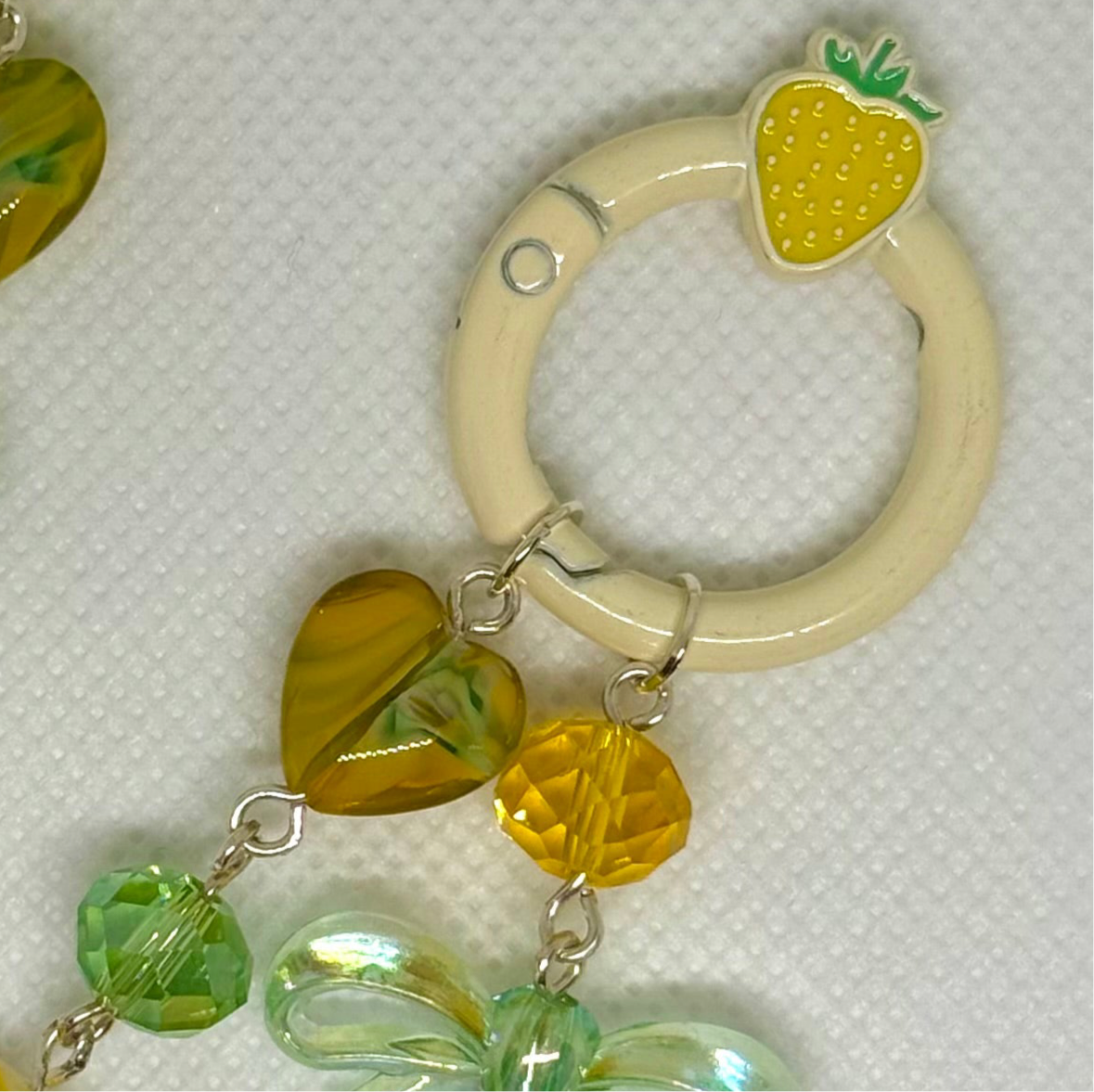 green and yellow pochacco charm
