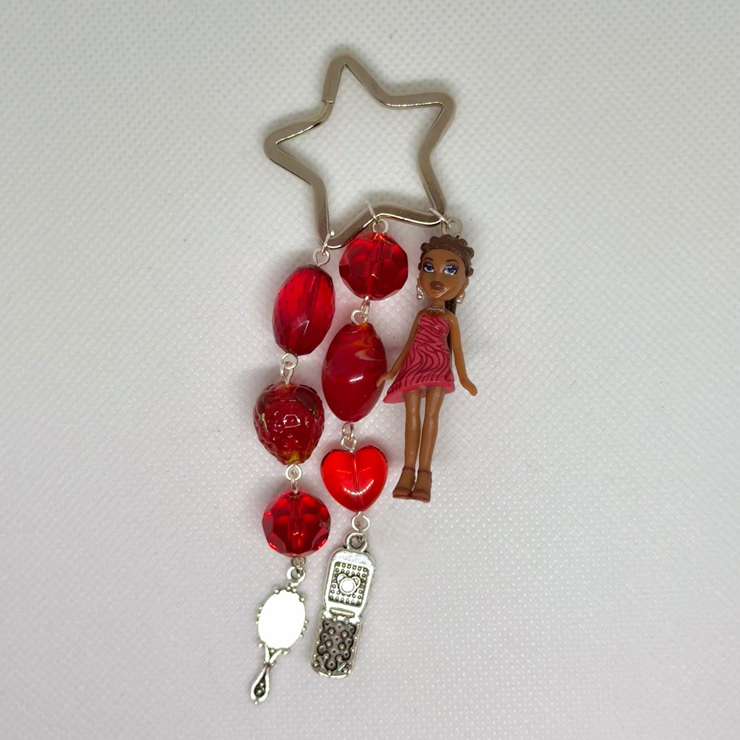 red sasha charm