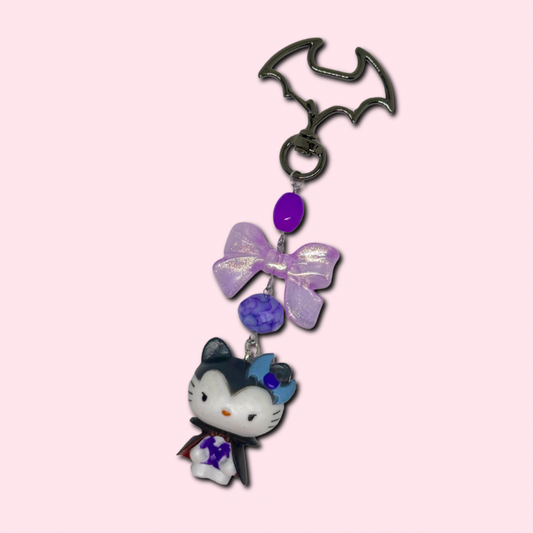 purple dracu-kitty charm
